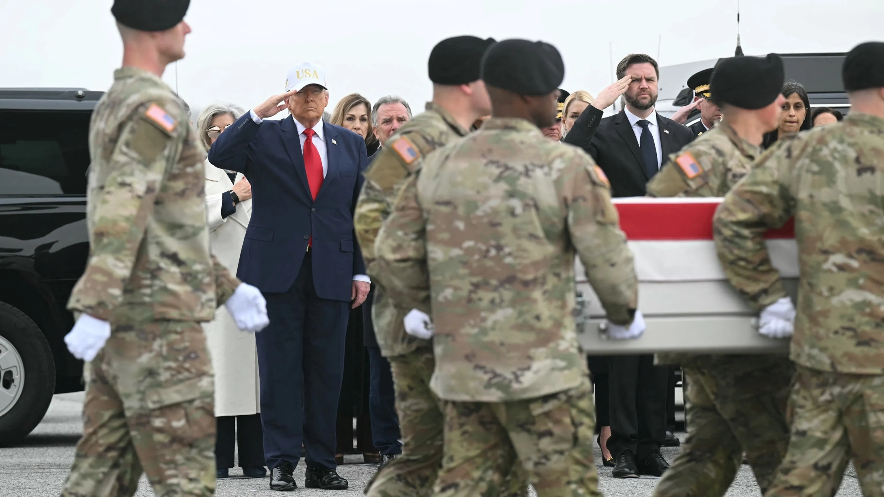Dignified transfer ceremony — Trump and military honor guard